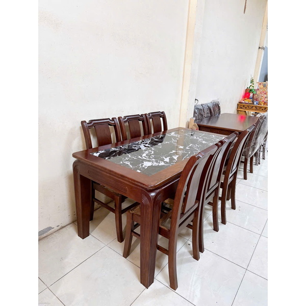 Bộ bàn ăn mặt đá ghế tựa cong