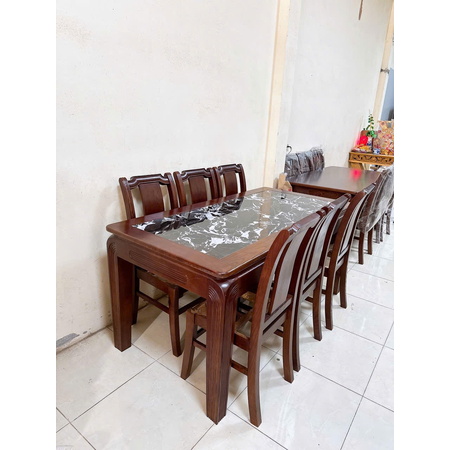 Bộ bàn ăn mặt đá ghế tựa cong